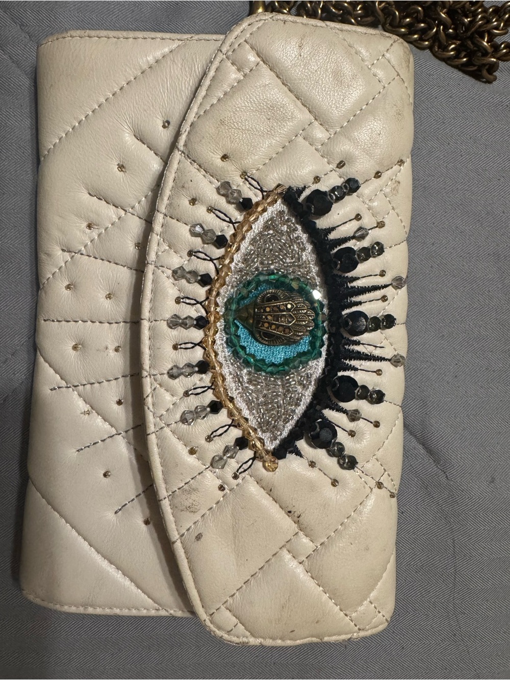 White Quilted Women’s Chain Crossbody Bag with Embellished Eye Accent